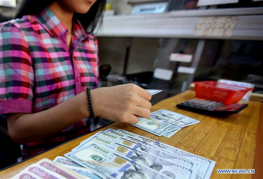 MYANMAR-YANGON-FOREIGN CURRENCY EXCHANGE-RAISING