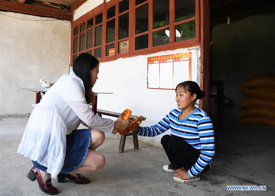 CHINA-CHONGQING-DISABLED FEMALE FARMER (CN)