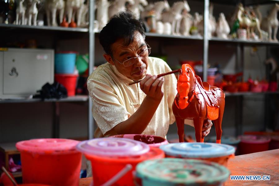 CHINA-HENAN-ART-TRI-COLORED GLAZED POTTERY-TECHNIQUE (CN)