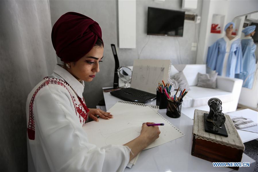 MIDEAST-GAZA-FASHION DESIGNER