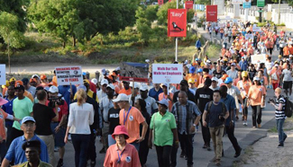 Participants take part in "walk for elephant" in Tanzania